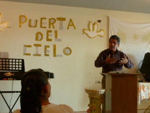 President of the ICDC Disciples Pastor Manuel Tovar preaches at a "house church" in Aguascalientes