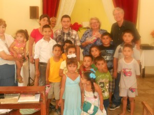 Pozole youth and children with Pastor Miguel Villa in back and Maribel on left