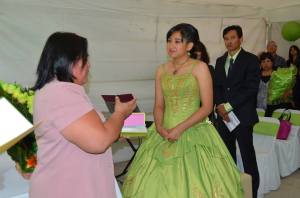 Marisol of Julien Carrillo Church gives Heidi a Bible