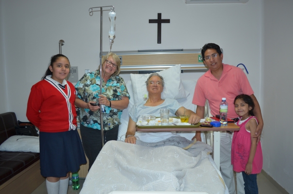 Dr. Mercado's Pastor Rogelio Espino Flores with daughters and Kate.  Total cost of my six night stay in Oli Med Hospital came to less than $4000.