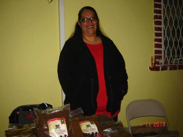 Nohemi Bravo is selling coffee after presenting the project at a church in San Luis Potosi 