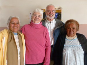 Fred and Mary greeting two of the La Reforma members who prepared the post-worship meal